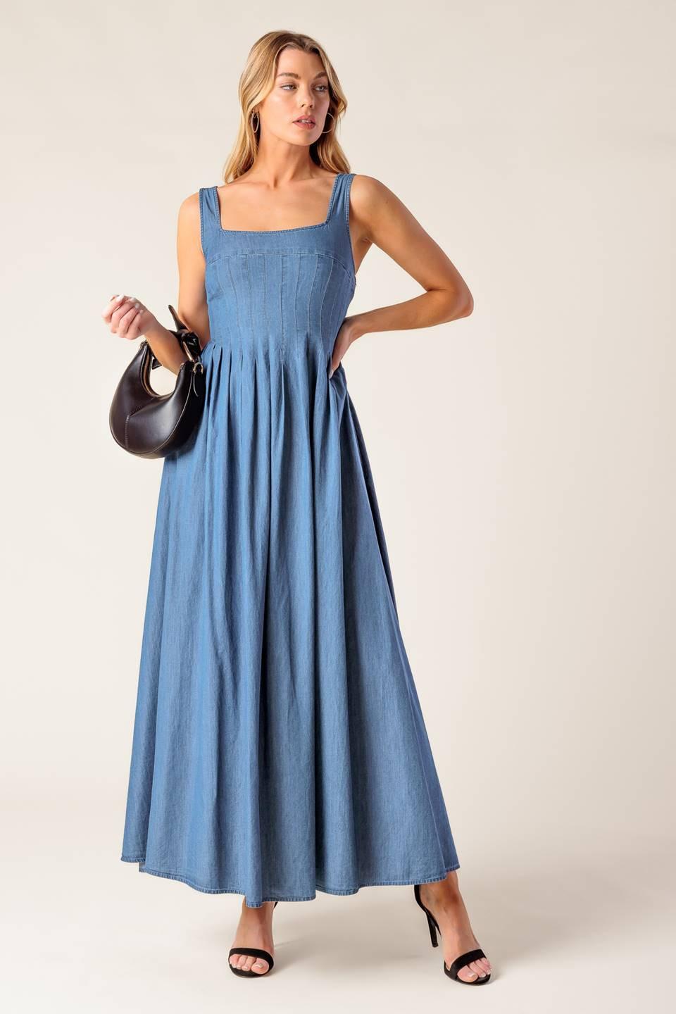 A washed lightweight denim midi dress featuring square neckline, sleeveless, pintuck bodice, full skirt and smocked back bodice