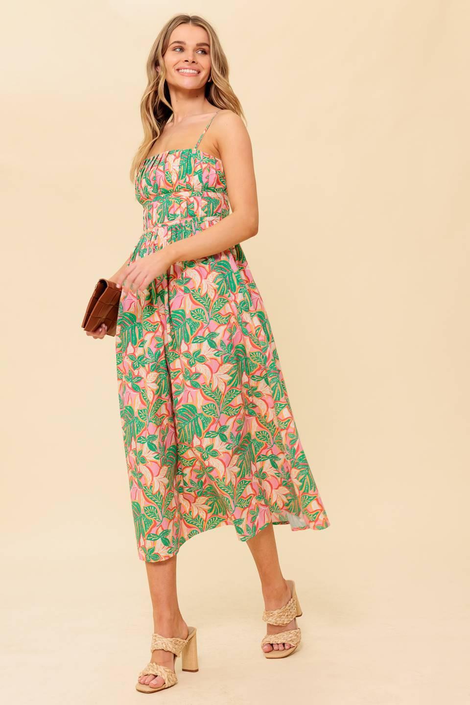 A printed woven midi dress featuring pleated bodice, straight neckline with shoulder strap, full skirt and back zipper closure