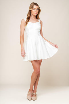 
A solid woven mini dress featuring sweetheart neckline, sleeveless, circle skirt and back zipper closure

Details:

Self : 97% Cotton 3% Spandex

Size &amp; Fit

- Model is 5`8" And Wearing Size Small
- Measurements Taken From Size Small
- Approx. Length: 33" FLYING TOMATO