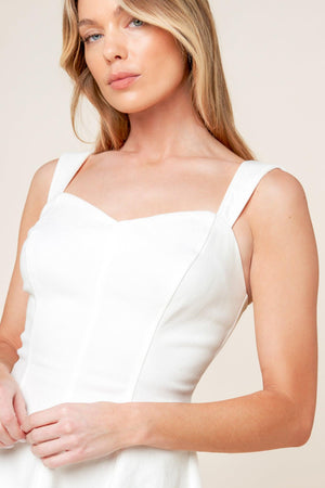 
A solid woven mini dress featuring sweetheart neckline, sleeveless, circle skirt and back zipper closure

Details:

Self : 97% Cotton 3% Spandex

Size &amp; Fit

- Model is 5`8" And Wearing Size Small
- Measurements Taken From Size Small
- Approx. Length: 33" FLYING TOMATO