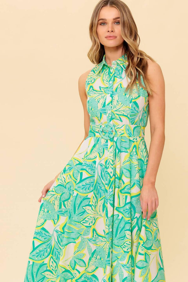 A printed woven midi dress featuring collar, sleeveless, button down and self belt
