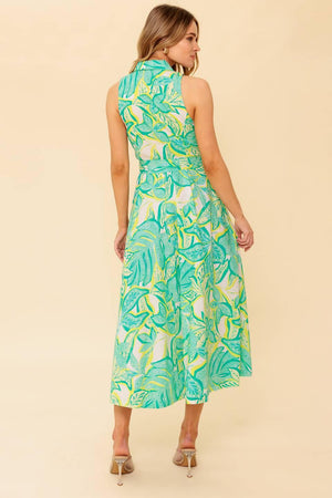 A printed woven midi dress featuring collar, sleeveless, button down and self belt