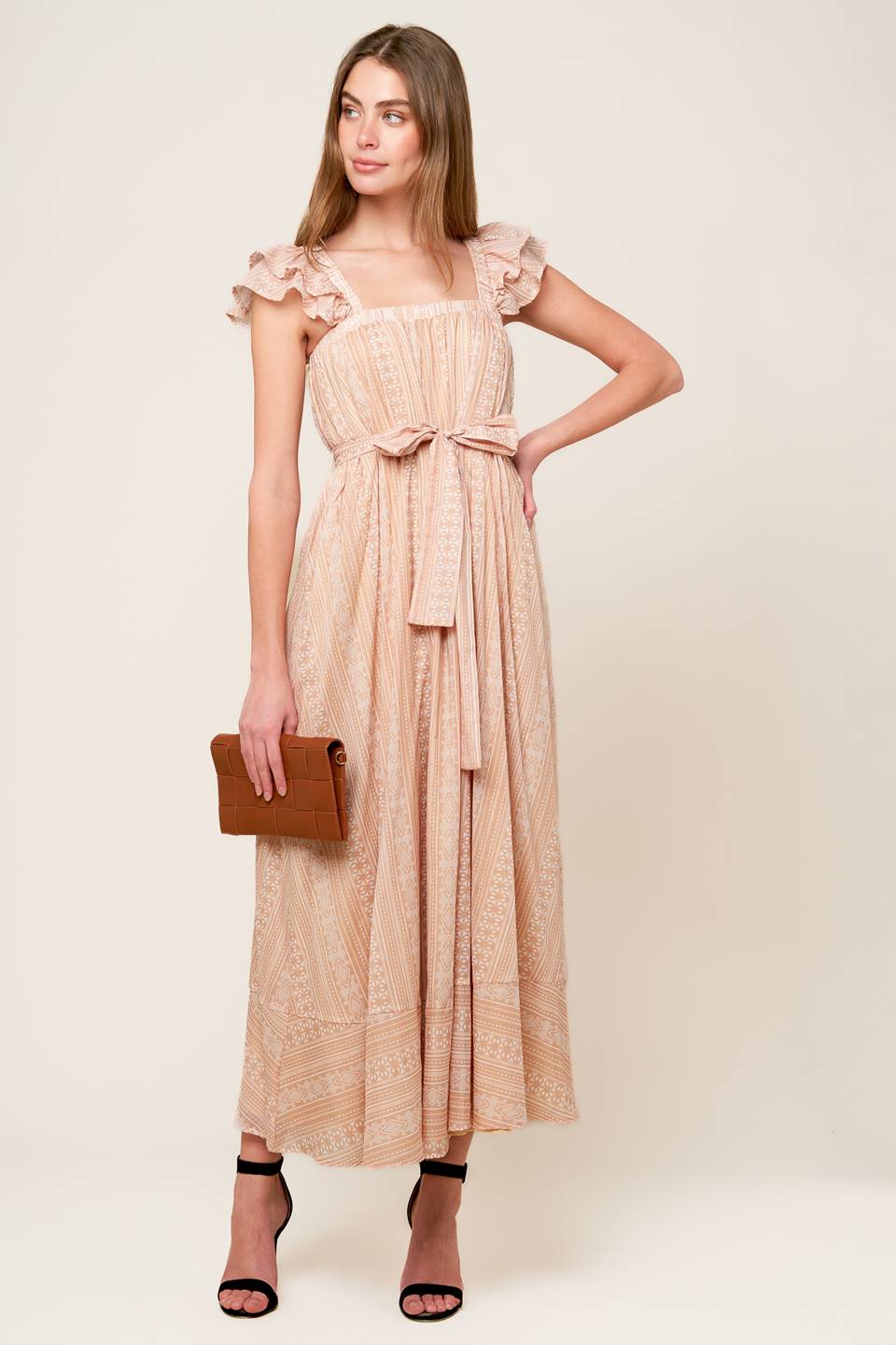 A textured woven midi dress featuring square neckline, double ruffed sleeve and self sash tie

Details:

Self : 100% Cotton
Lining : 100% Polyester

Size & Fit

- Model is 5`8" And Wearing Size Small
- Measurements Taken From Size Small
- Approx. Length: 55"