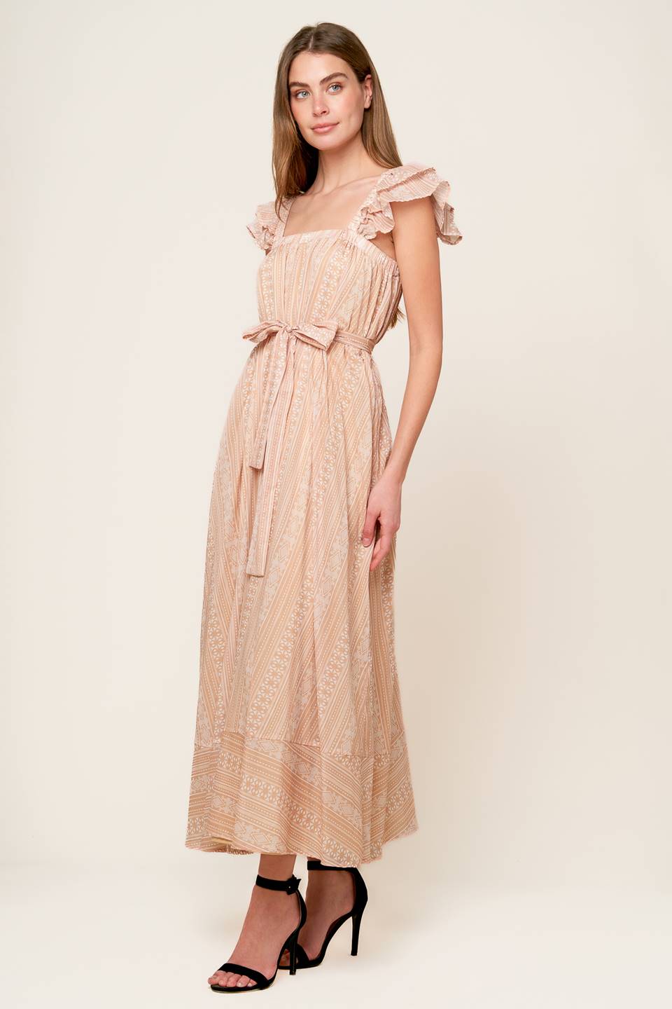 A textured woven midi dress featuring square neckline, double ruffed sleeve and self sash tie

Details:

Self : 100% Cotton
Lining : 100% Polyester

Size & Fit

- Model is 5`8" And Wearing Size Small
- Measurements Taken From Size Small
- Approx. Length: 55"