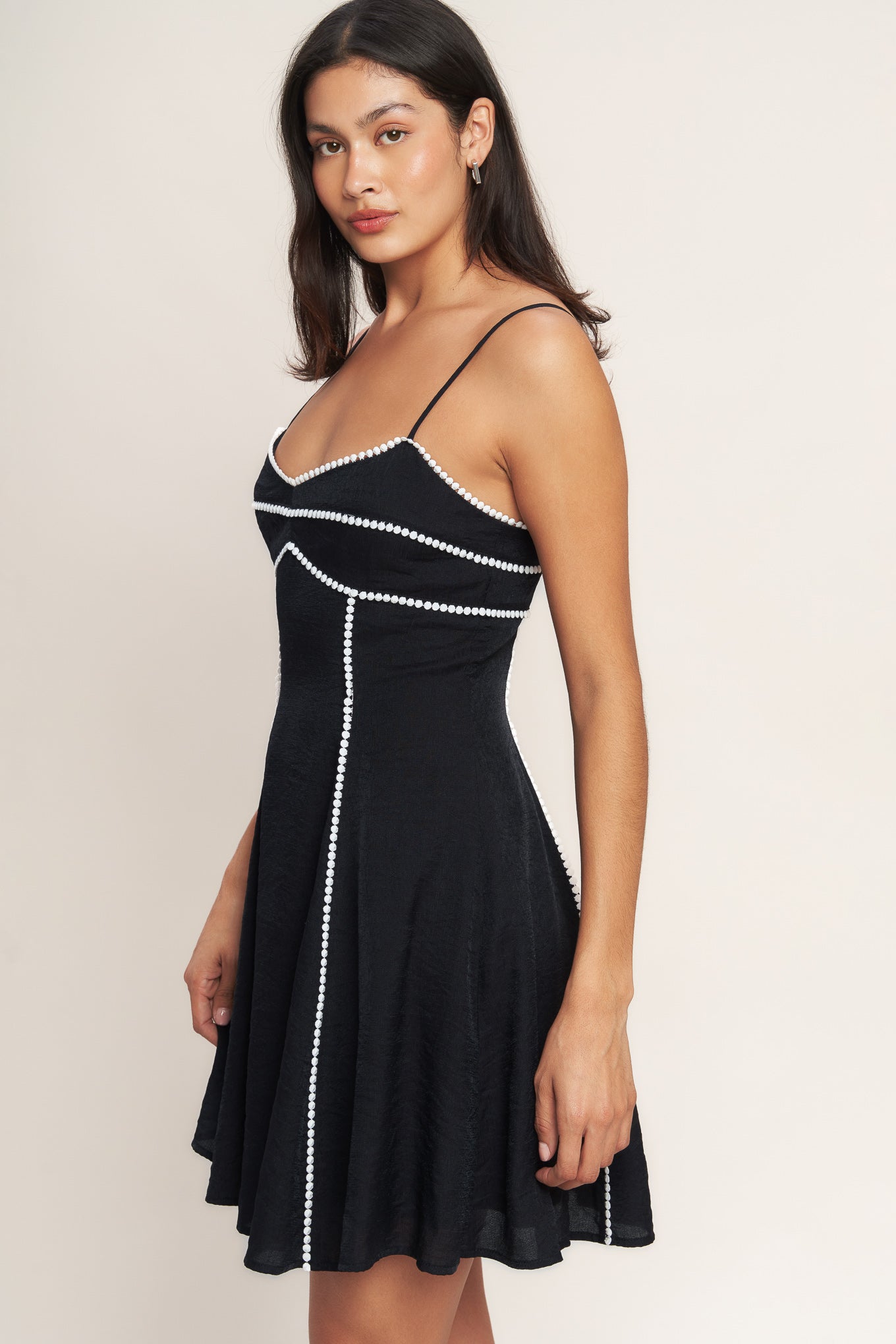 
A solid woven mini dress featuring cami top, straps, lace trim, circle skirt and back zipper closure

Details:

Self : 80% Rayon 20% Nylon
Lining : 100% Polyester Exclusive of Decoration

Size &amp; Fit

- Model is 5`8" And Wearing Size Small
- Measurements Taken From Size Small
- Approx. Length: 35" Flying Tomato