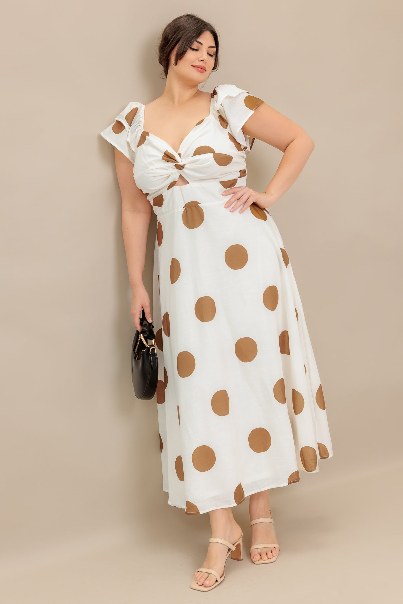 A printed woven midi dress featuring sweetheart neckline, double ruffle short sleeve, twisted bodice with center cut out, wide waist band, circle skirt and smocked back bodice.

Details:

Self : 100% Polyester
Lining : 100% Polyester

Size &amp; Fit

- Model is 5`8" And Wearing Size Small
- Measurements Taken From Size Small
- Approx. Length: 53"