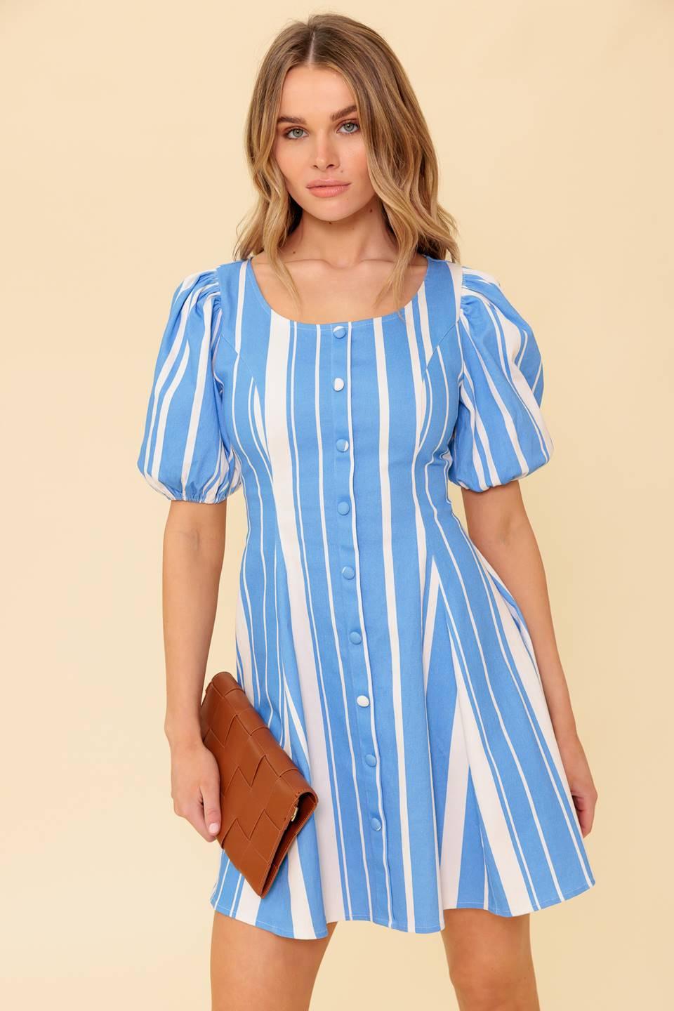 A blue and white stripe, printed woven mini dress featuring wide round neckline, short puff sleeve, front button down detail and back zipper closure