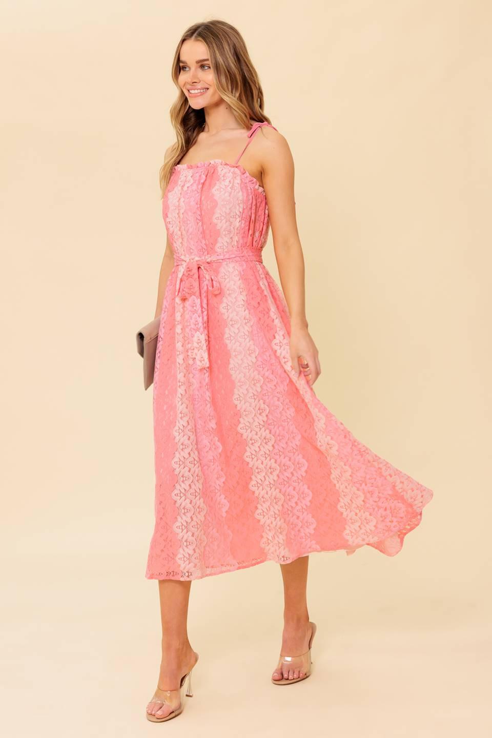 A printed woven lace midi dress featuring straight neckline with ruffled edge, straps and self sash tie