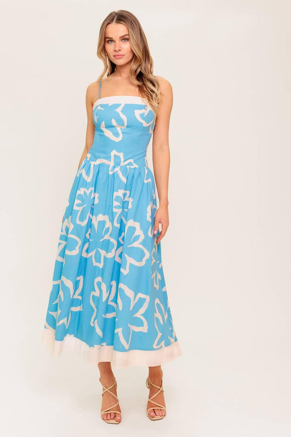 A printed woven midi dress featuring straight neckline, contrasting border and smocked back bodice.