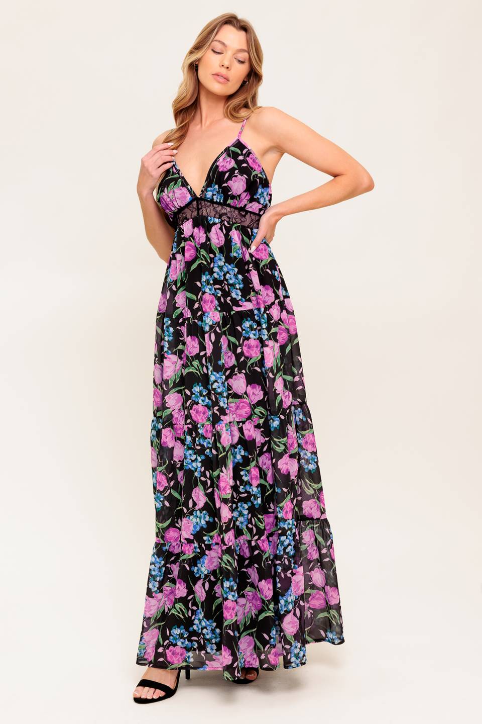 A printed woven maxi dress featuring cami top, lace waistband, tiered skirt and elasticized back waistband