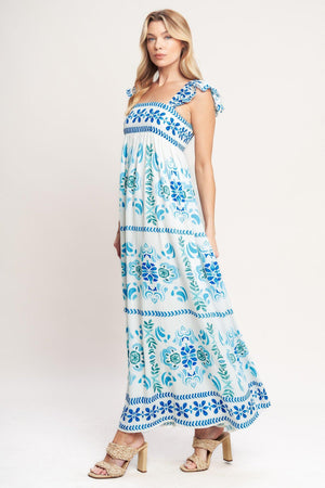 A printed woven maxi dress featuring square neckline, short flutter sleeve and smocked back bodice

Details:

Self: 100% Polyester

Lining: 100% Polyester

Size & Fit

-Model is 5`8" And Wearing Size Small
-Measurements Taken From Size Small
-Approx. Length: 56"
