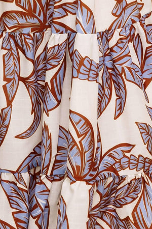A printed woven midi dress featuring off shoulder neckline, flounce, elasticized waist with self sash tie and tiered skirt.