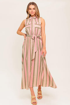 A striped woven midi dress featuring collar, button down, pockets, elasticized waist, self sash and full skirt.
