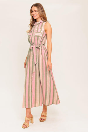 A striped woven midi dress featuring collar, button down, pockets, elasticized waist, self sash and full skirt.