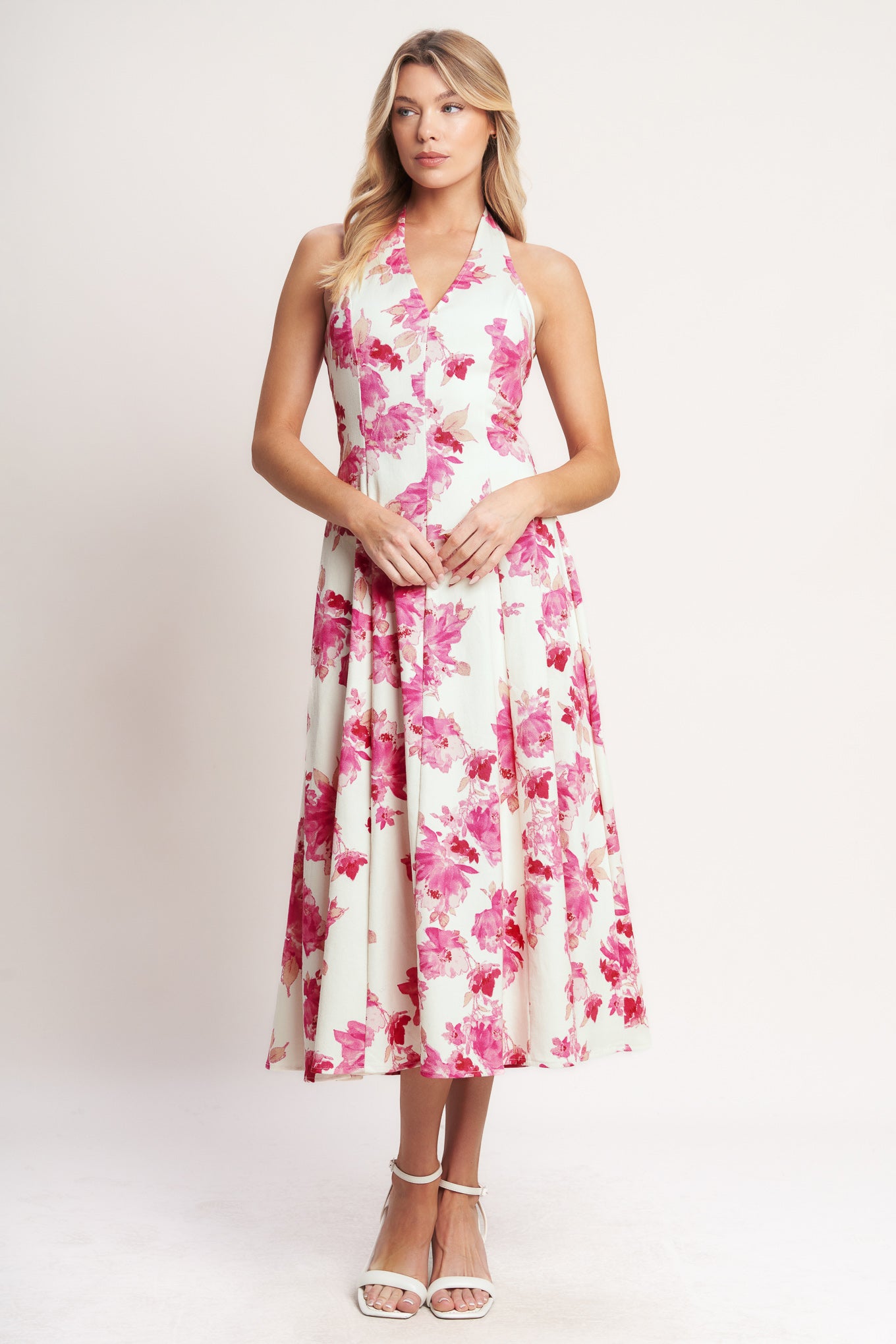
A printed woven halter midi dress featuring V neckline with back button closure, circle skirt, bare back and zipper closure

Details:

Self : 97% Cotton 3% Spandex

Size &amp; Fit

- Model is 5`8" And Wearing Size Small
- Measurements Taken From Size Small
- Approx. Length: 50"