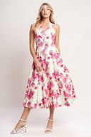
A printed woven halter midi dress featuring V neckline with back button closure, circle skirt, bare back and zipper closure

Details:

Self : 97% Cotton 3% Spandex

Size &amp; Fit

- Model is 5`8" And Wearing Size Small
- Measurements Taken From Size Small
- Approx. Length: 50"
