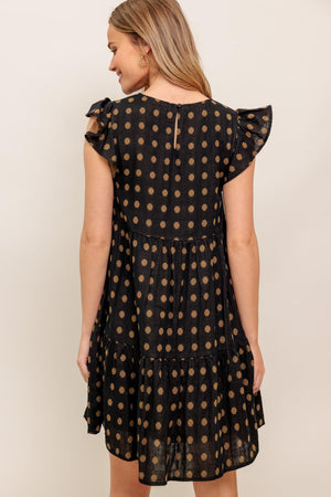A textured woven mini dress featuring round neckline, ruffled sleeve, tiered body and back neck button closure