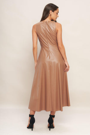 A faux leather midi dress featuring round neckline, sleeveless, circle skirt and back zipper closure