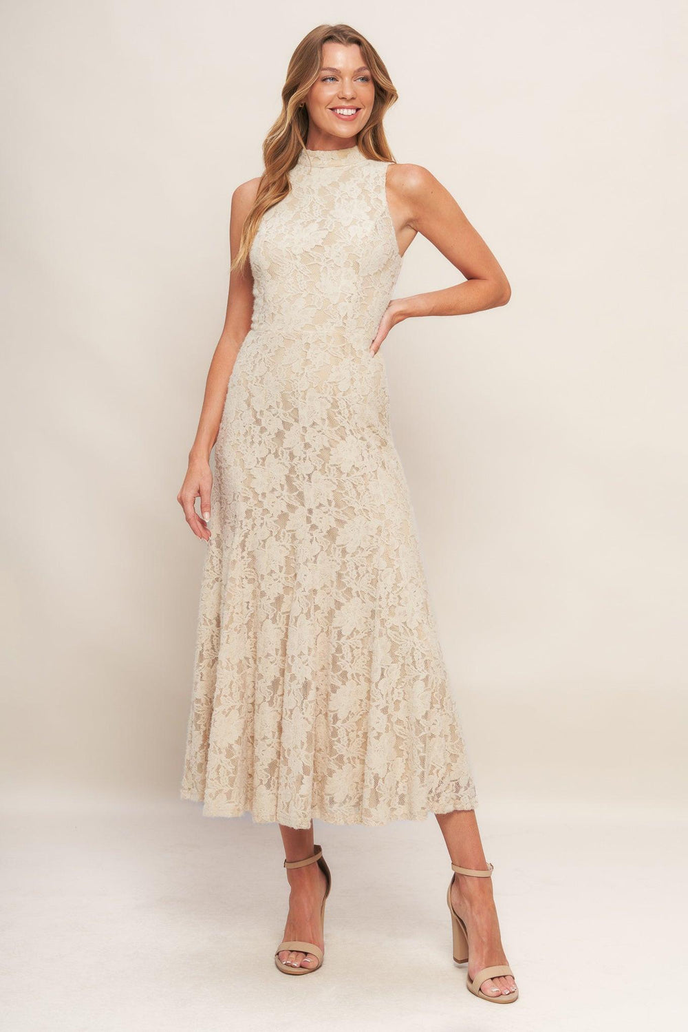 A stretch lace midi dress featuring mock neckline, sleeveless and back zipper closure