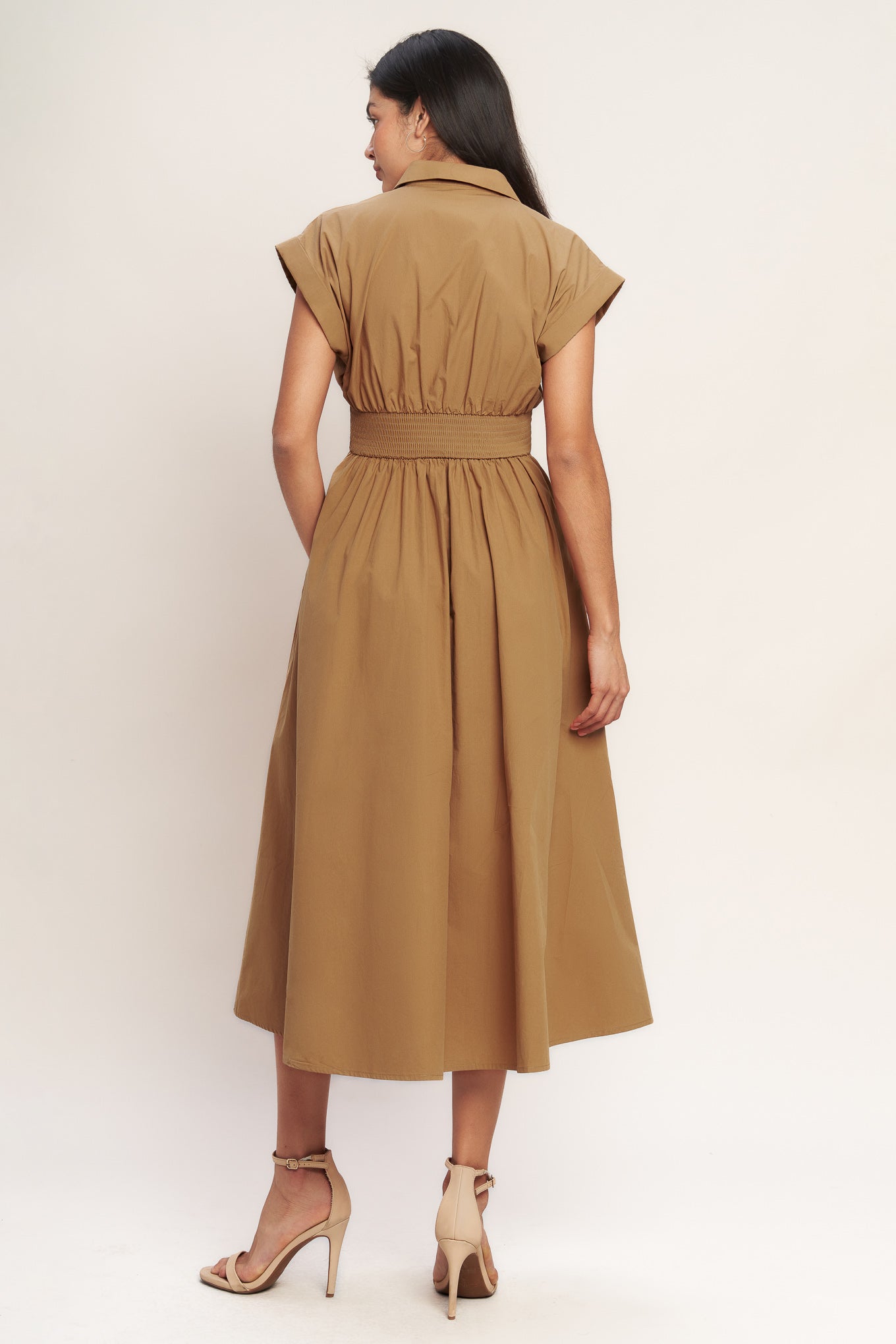 
A solid woven midi dress featuring collar, short cuffed sleeve, button down, wide waistband, full skirt and smocked back waistband

Details:

Self : 100% Polyester
Lining : 100% Polyester

Size &amp; Fit

- Model is 5`8" And Wearing Size Small
- Measurements Taken From Size Small
- Approx. Length: 51" Flying Tomato