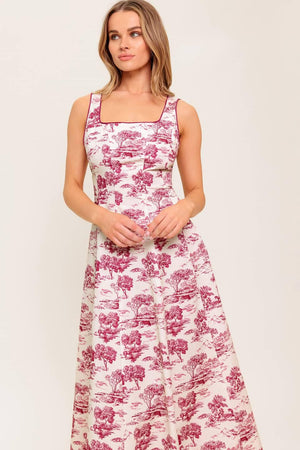 A printed woven midi dress featuring square neckline, sleeveless, circle skirt and back zipper closure.