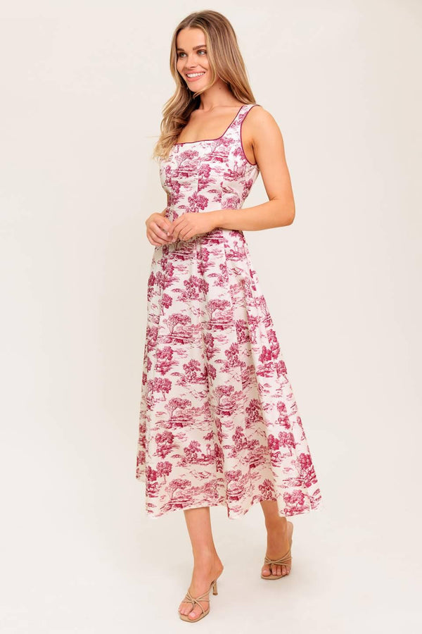 A printed woven midi dress featuring square neckline, sleeveless, circle skirt and back zipper closure.
