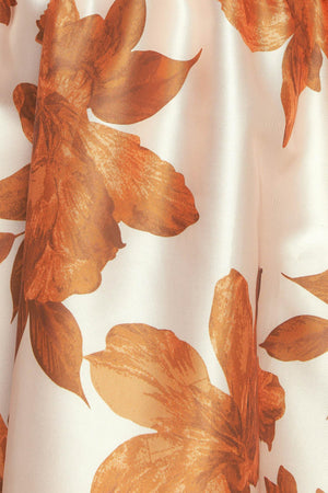 A printed woven midi dress featuring U neckline, sleeveless, full skirt and back zipper closure
