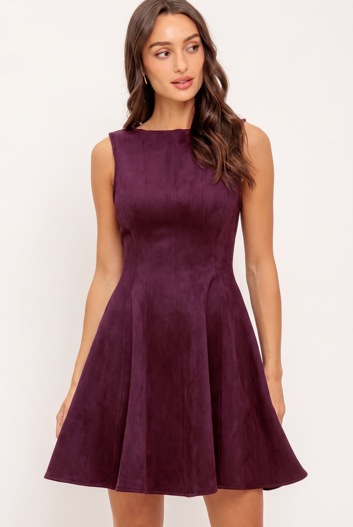 Woman wearing a plum burgundy suede mini dress | Flying Tomato
