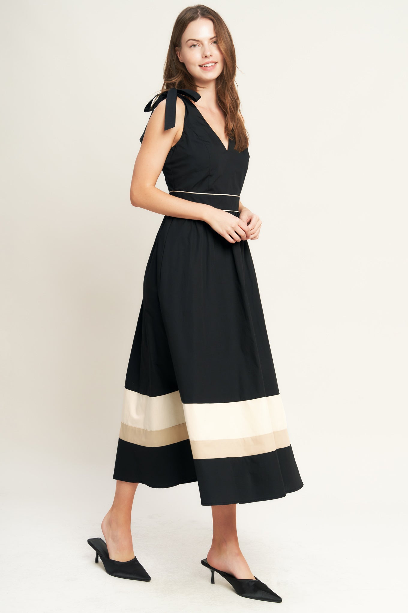 A solid woven color blocked midi dress featuring V neckline, shoulder tie, sleeveless, full skirt and back zipper closure

Details:

Self : 100% Cotton
Contrast : 100% Cotton
Lining : 100% Polyester

Size &amp; Fit

- Model is 5`8" And Wearing Size Small
- Measurements Taken From Size Small
- Approx. Length: 52" Flying Tomato
