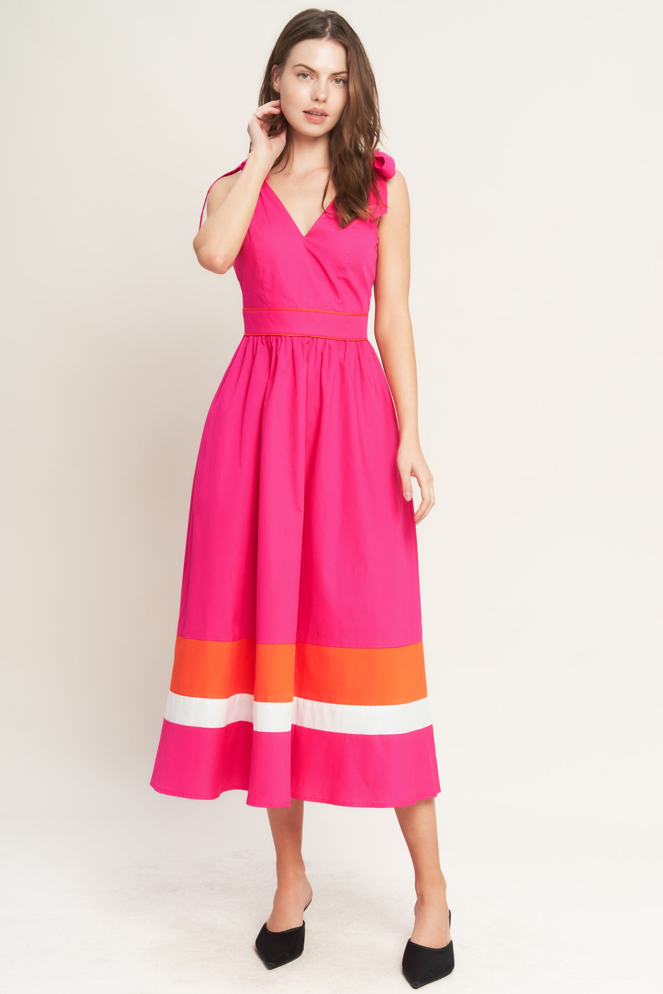 A solid woven color blocked midi dress featuring V neckline, shoulder tie, sleeveless, full skirt and back zipper closure

Details:

Self : 100% Cotton
Contrast : 100% Cotton
Lining : 100% Polyester

Size &amp; Fit

- Model is 5`8" And Wearing Size Small
- Measurements Taken From Size Small
- Approx. Length: 52" Flying Tomato