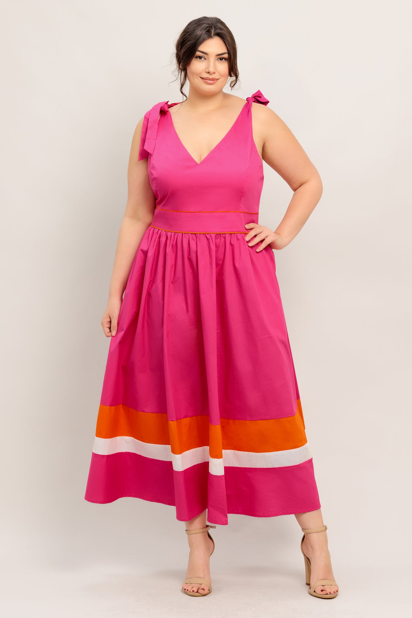 A solid woven color blocked midi dress featuring V neckline, shoulder tie, sleeveless, full skirt and back zipper closure

Details:

Self : 100% Cotton
Contrast : 100% Cotton
Lining : 100% Polyester

Size &amp; Fit

- Model is 5`8" And Wearing Size Small
- Measurements Taken From Size Small
- Approx. Length: 52" Flying Tomato