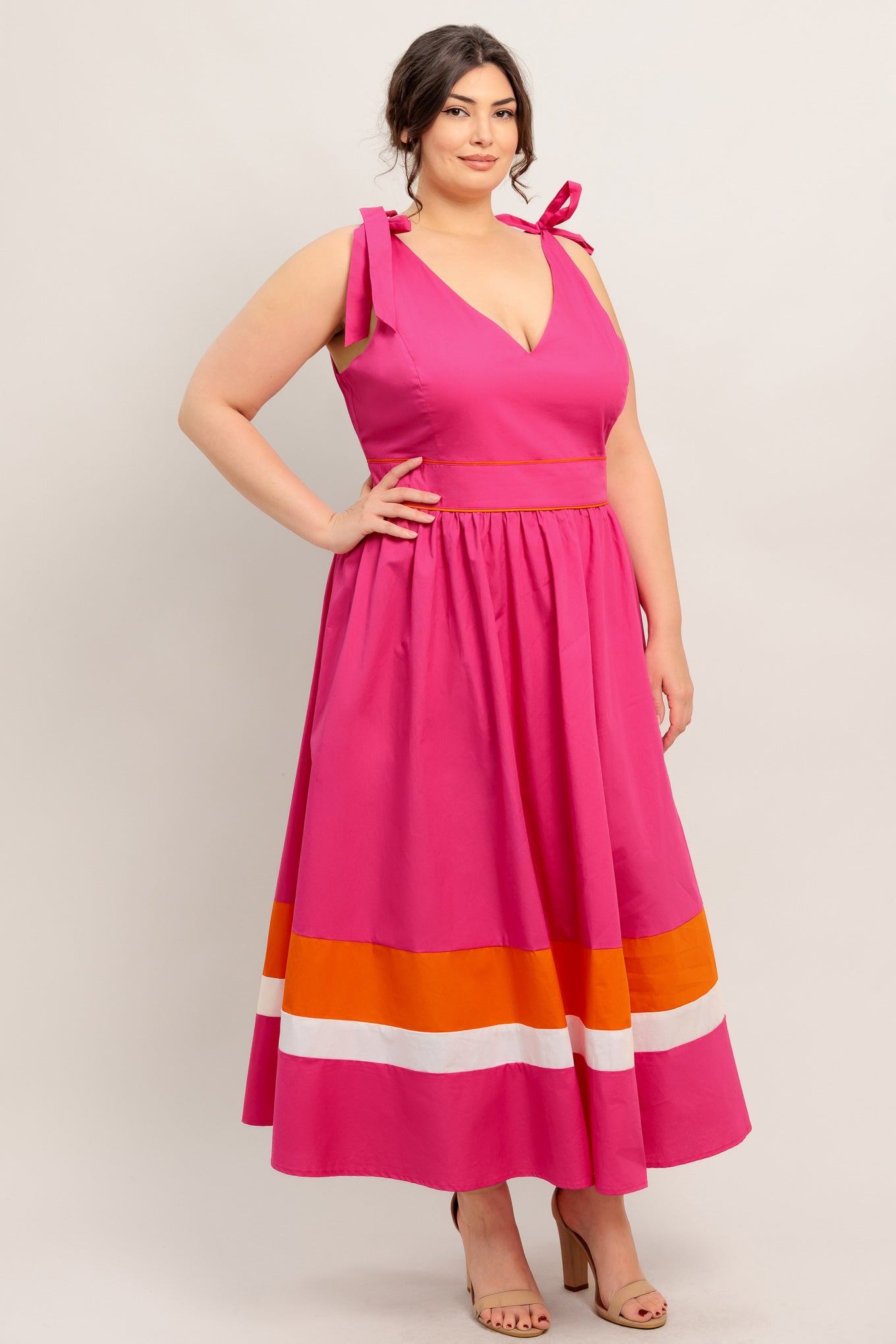 A solid woven color blocked midi dress featuring V neckline, shoulder tie, sleeveless, full skirt and back zipper closure

Details:

Self : 100% Cotton
Contrast : 100% Cotton
Lining : 100% Polyester

Size &amp; Fit

- Model is 5`8" And Wearing Size Small
- Measurements Taken From Size Small
- Approx. Length: 52" Flying Tomato
