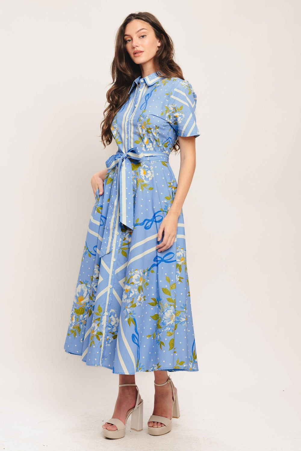 A printed woven midi dress featuring collar, short sleeve, button down, self sash tie and circle skirt

Details:

Self: 100% Cotton

Size & Fit

-Model is 5`8" And Wearing Size Small
-Measurements Taken From Size Small
-Approx. Length: 51"