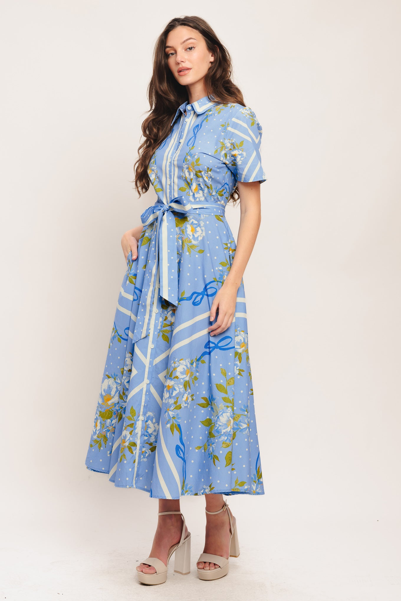 A printed woven midi dress featuring collar, short sleeve, button down, self sash tie and circle skirt

Details:

Self: 100% Cotton

Size & Fit

-Model is 5`8" And Wearing Size Small
-Measurements Taken From Size Small
-Approx. Length: 51"