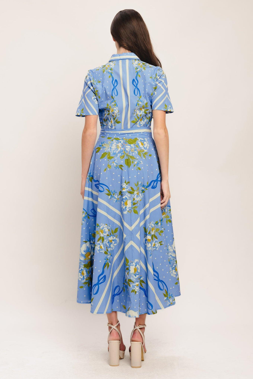 A printed woven midi dress featuring collar, short sleeve, button down, self sash tie and circle skirt

Details:

Self: 100% Cotton

Size & Fit

-Model is 5`8" And Wearing Size Small
-Measurements Taken From Size Small
-Approx. Length: 51"