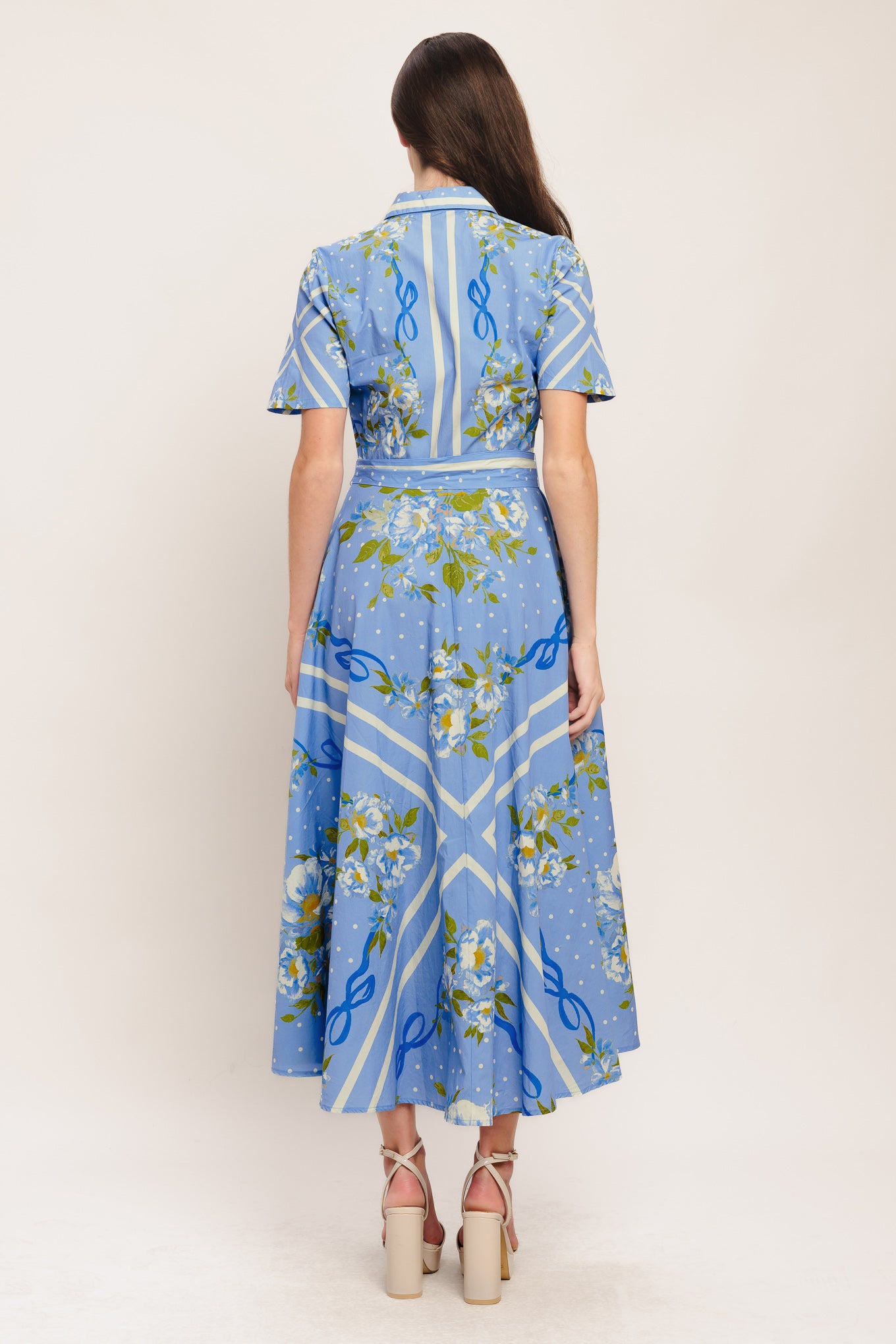 A printed woven midi dress featuring collar, short sleeve, button down, self sash tie and circle skirt

Details:

Self: 100% Cotton

Size & Fit

-Model is 5`8" And Wearing Size Small
-Measurements Taken From Size Small
-Approx. Length: 51"
