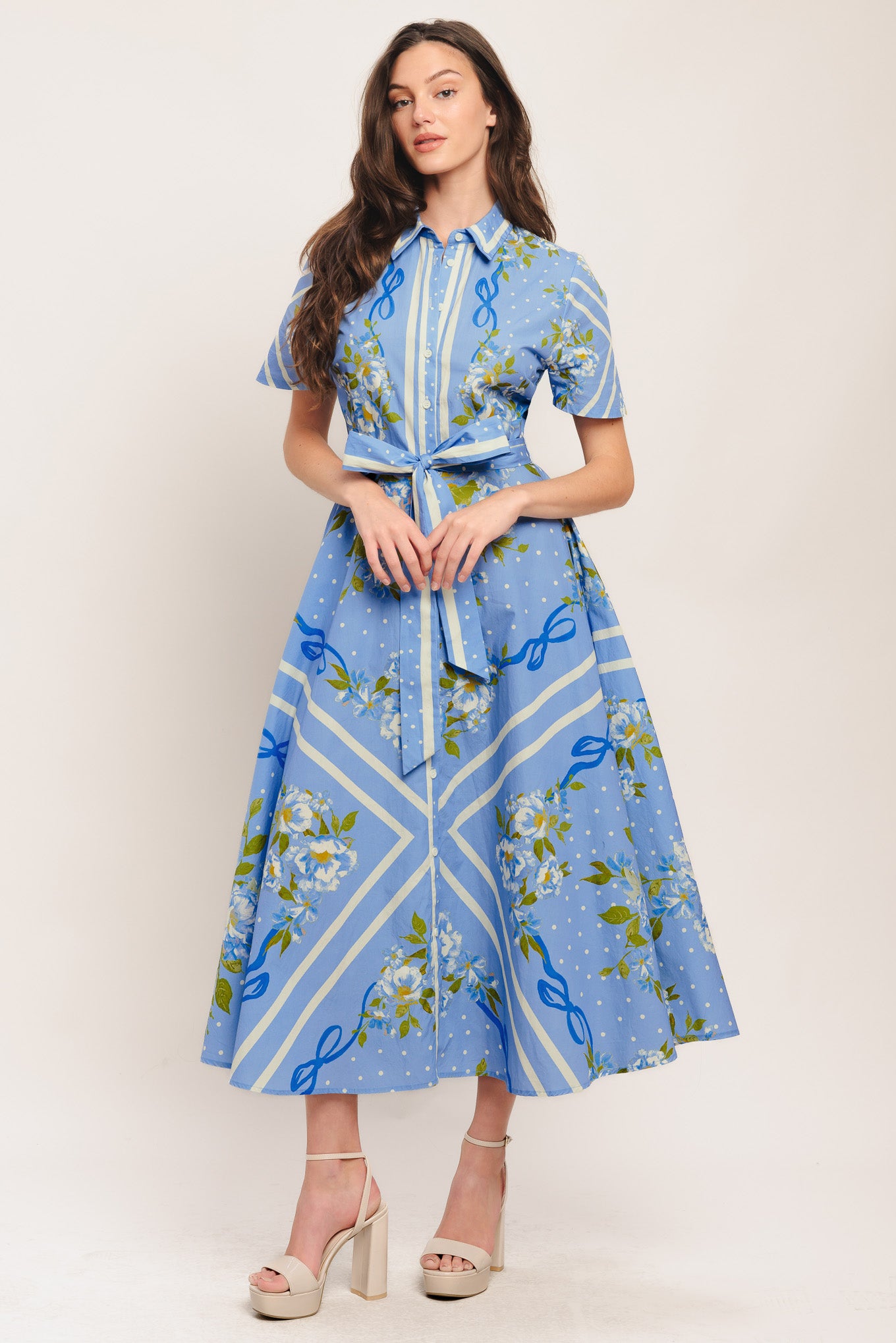 A printed woven midi dress featuring collar, short sleeve, button down, self sash tie and circle skirt

Details:

Self: 100% Cotton

Size & Fit

-Model is 5`8" And Wearing Size Small
-Measurements Taken From Size Small
-Approx. Length: 51"