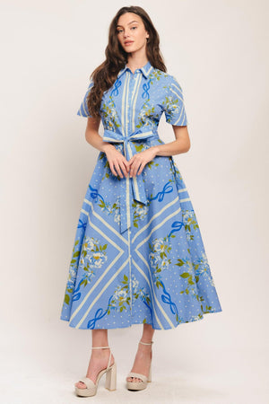 A printed woven midi dress featuring collar, short sleeve, button down, self sash tie and circle skirt

Details:

Self: 100% Cotton

Size & Fit

-Model is 5`8" And Wearing Size Small
-Measurements Taken From Size Small
-Approx. Length: 51"