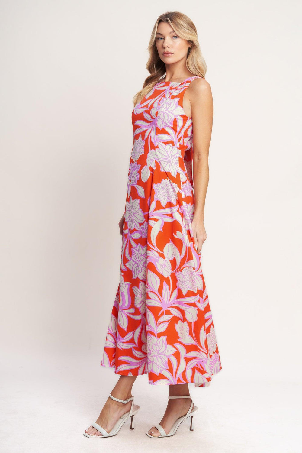 
A printed woven midi dress featuring square neckline, sleeveless, circle skirt, bare back with tie and zipper closure

Details:

Self : 100% Cotton
Lining : 100% Polyester

Size &amp; Fit

- Model is 5`8" And Wearing Size Small
- Measurements Taken From Size Small
- Approx. Length: 52"