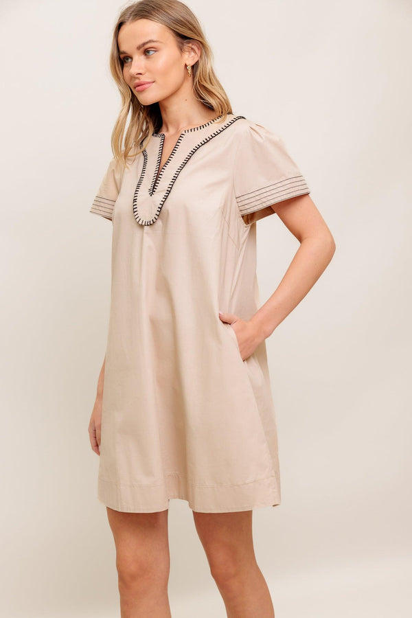 CALM SILHOUETTE WOVEN MINI DRESS.