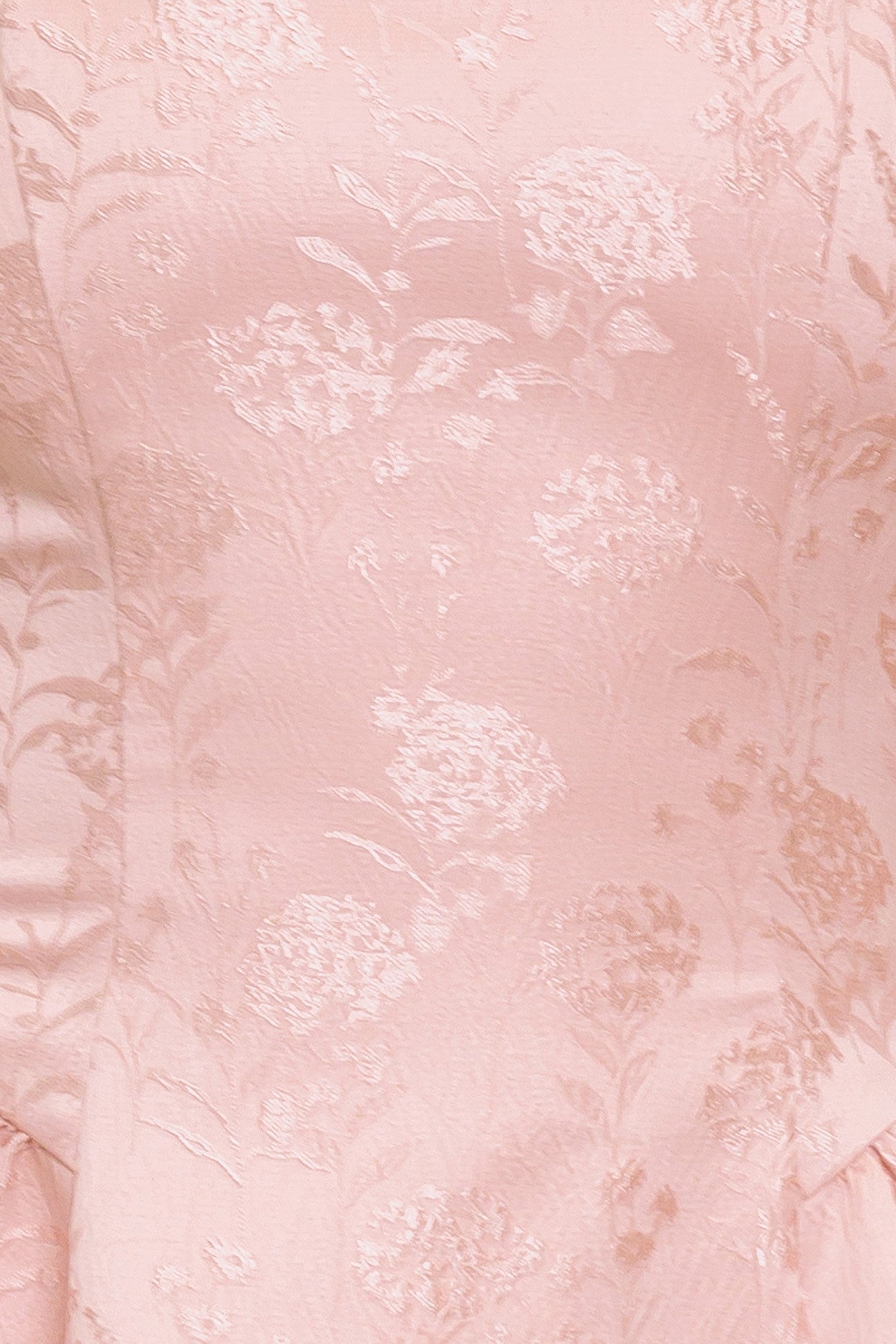 A woven jacquard satin mini dress featuring square neckline, sleeveless, side shirring and back zipper closure