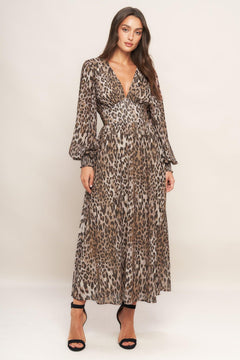 A printed woven midi dress featuring V neckline, long sleeve with smocked cuff, waist yoke and smocked back waist band