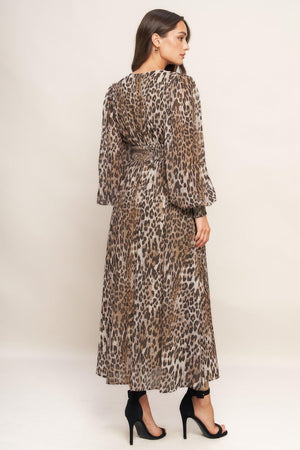 A printed woven midi dress featuring V neckline, long sleeve with smocked cuff, waist yoke and smocked back waist band
