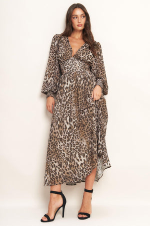 A printed woven midi dress featuring V neckline, long sleeve with smocked cuff, waist yoke and smocked back waist band