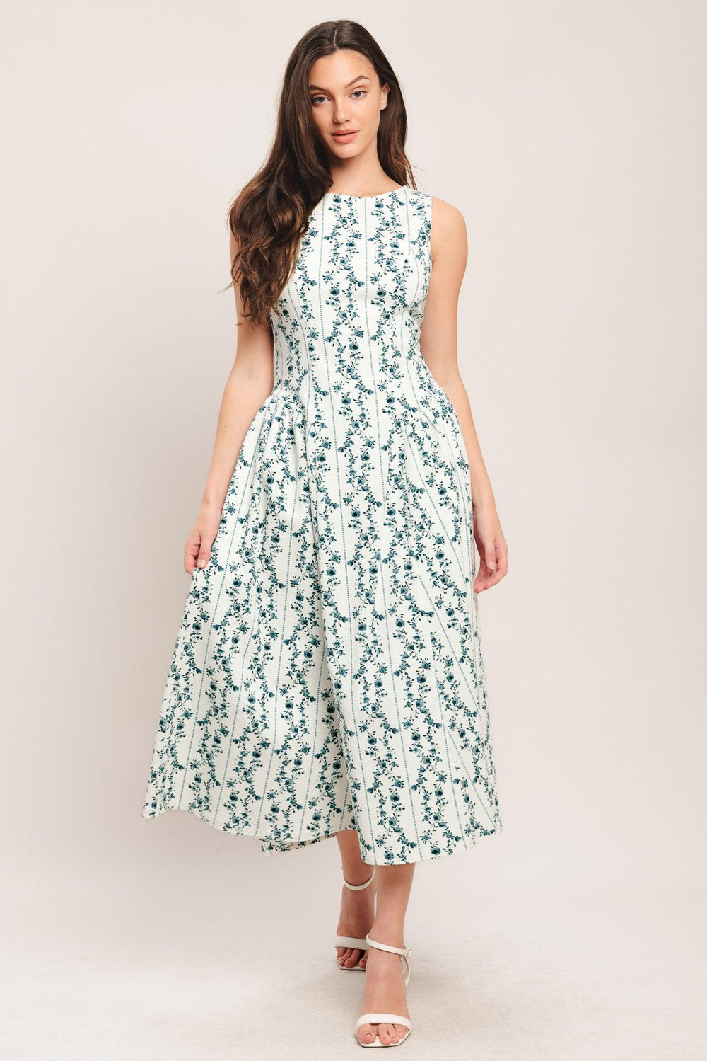 
A printed woven midi dress featuring round neckline, sleeveless, side shirred full skirt and back zipper closure

Details:

Self : 97% Cotton 3% Spandex

Size &amp; Fit

- Model is 5`8" And Wearing Size Small
- Measurements Taken From Size Small
- Approx. Length: 50"