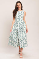 
A printed woven midi dress featuring round neckline, sleeveless, side shirred full skirt and back zipper closure

Details:

Self : 97% Cotton 3% Spandex

Size &amp; Fit

- Model is 5`8" And Wearing Size Small
- Measurements Taken From Size Small
- Approx. Length: 50"