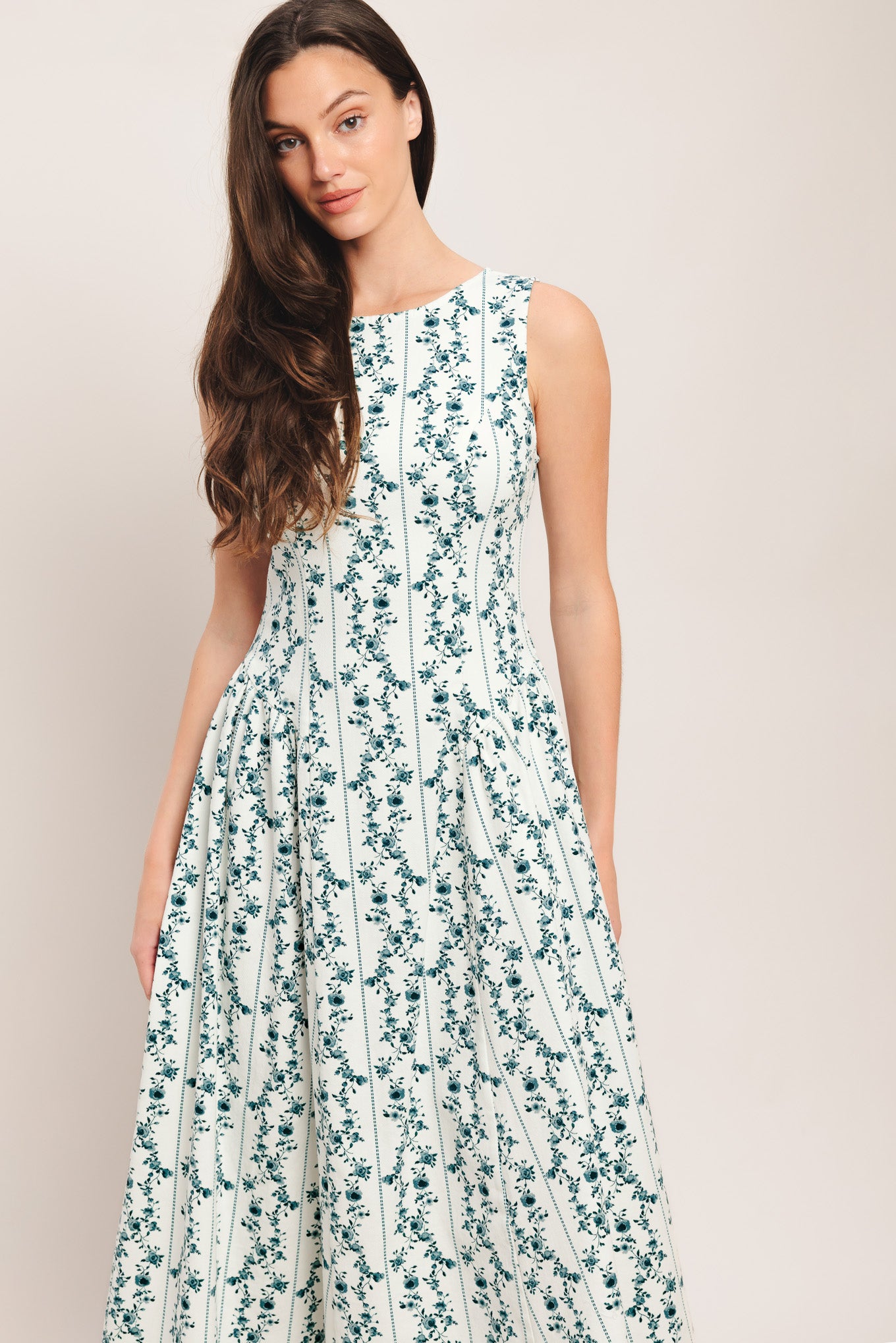 
A printed woven midi dress featuring round neckline, sleeveless, side shirred full skirt and back zipper closure

Details:

Self : 97% Cotton 3% Spandex

Size &amp; Fit

- Model is 5`8" And Wearing Size Small
- Measurements Taken From Size Small
- Approx. Length: 50"