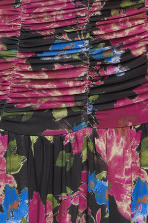 A printed power mesh maxi dress featuring straight neckline, straps, side shirring and back zipper closure