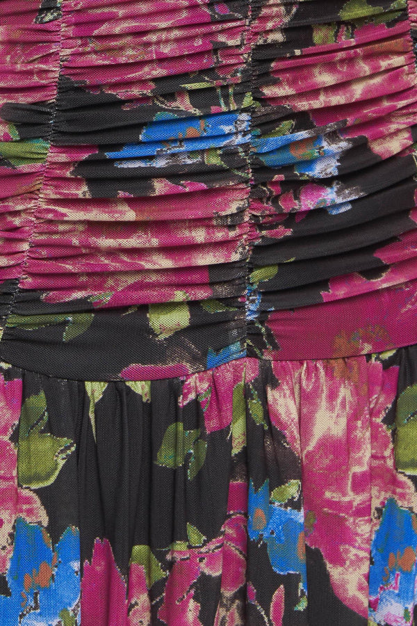 A printed power mesh maxi dress featuring straight neckline, straps, side shirring and back zipper closure