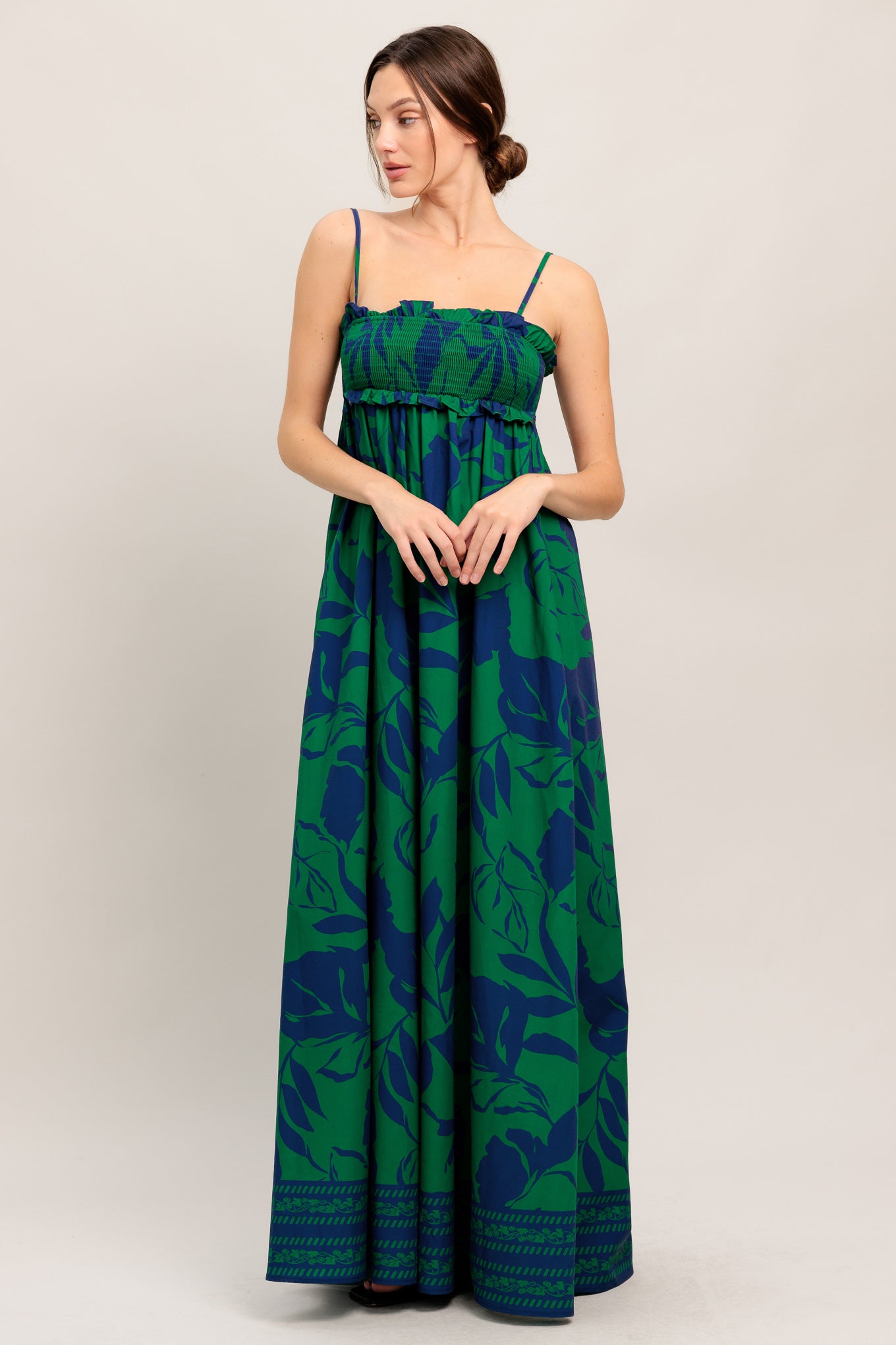 
A printed woven maxi dress featuring straight neckline with ruffled edge, straps and smocked bodice

Details:

Self : 100% Polyester
Lining : 100% Polyester

Size &amp; Fit

- Model is 5`8" And Wearing Size Small
- Measurements Taken From Size Small
- Approx. Length: 59" Flying Tomato